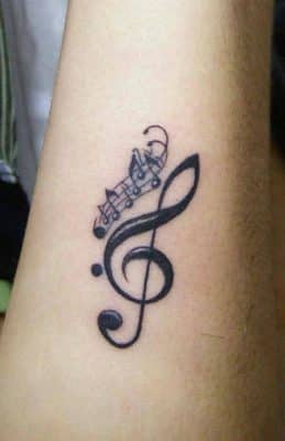 tatuajes de letras musicales notas