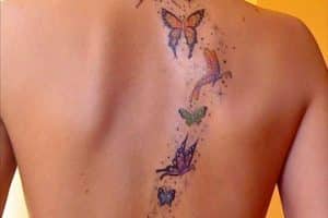 tatuajes de mariposas y estrellas espalda