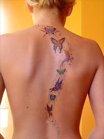 tatuajes de mariposas y estrellas espalda