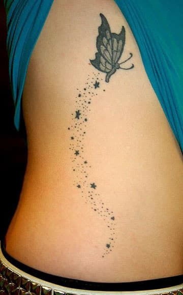 tatuajes de mariposas y estrellas torso