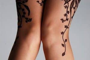tatuajes de enredaderas en la pierna fino