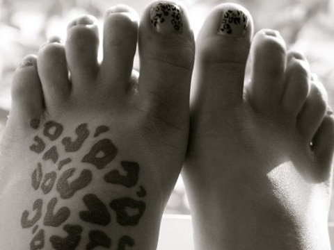 tatuajes de manchas de leopardo pies