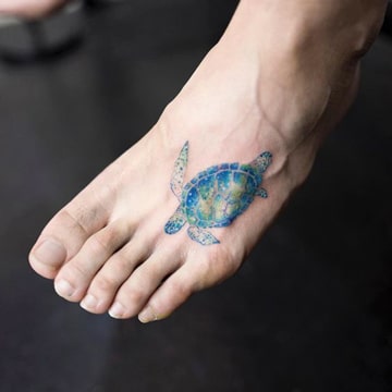 tatuajes de tortugas marinas en pie