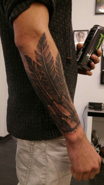 estilos de tatuajes para hombres de plumas