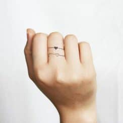 El simbolismo de los tatuajes de anillos para mujeres