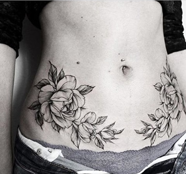 tatuajes en el vientre mujeres con estrias