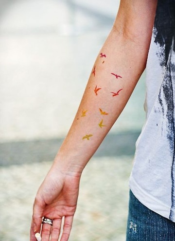 simbolos de libertad para tatuajes de mujer