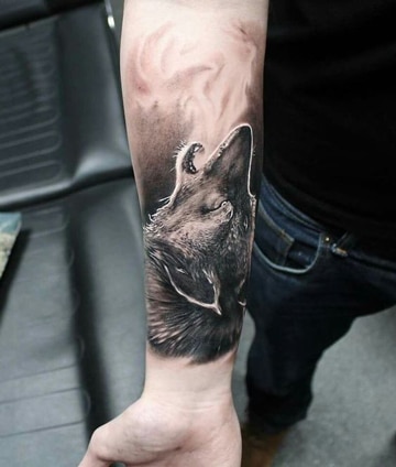 tattoos en el antebrazo para hombres con lobos