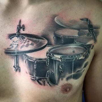 tatuajes de musica para hombres en pecho