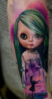 tatuajes de muñecas de trapo en brazo
