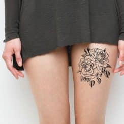 Gran feminidad de los tatuajes en los muslos para mujeres