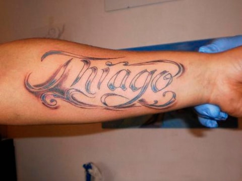 tatuajes con el nombre thiago en antebrazo