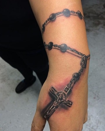 tatuajes de rosarios en el antebrazo diseños