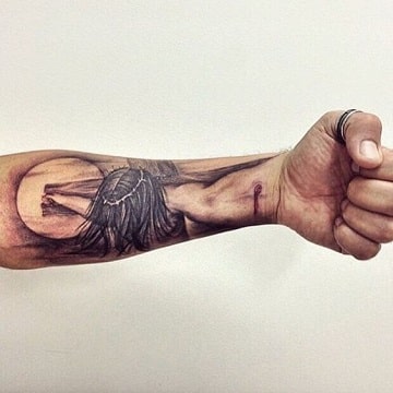tatuajes religiosos para hombres en el brazo