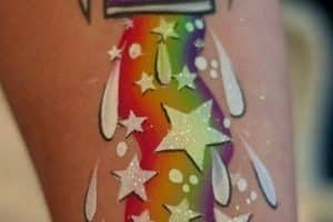 tatuajes de colores en el brazo nave espacia