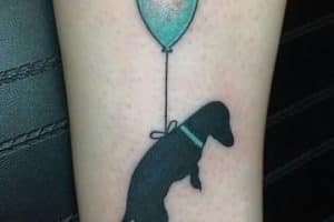 tatuajes de perros salchichas silueta