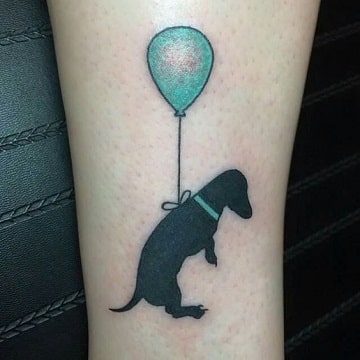tatuajes de perros salchichas silueta