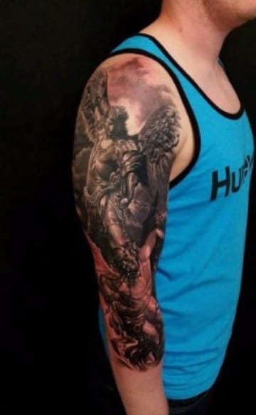 tatuajes de angeles guerreros en el brazo realistas