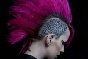 tatuajes de manchas de leopardo en la cabeza