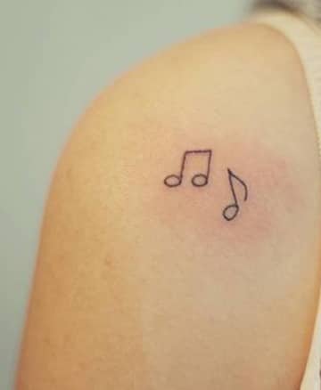 tatuajes de signos musicales pequeños