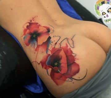 tatuajes de flores en acuarela espalda baja