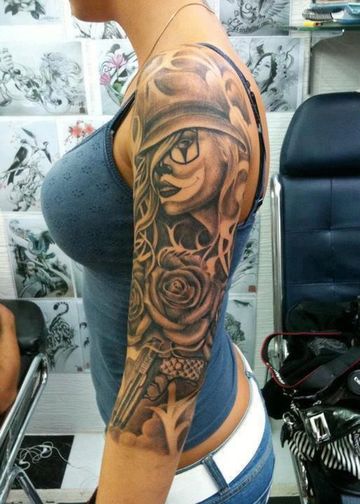 tatuajes de catrinas en el brazo de mujer
