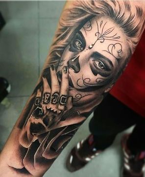 tatuajes de catrinas en el brazo hombre