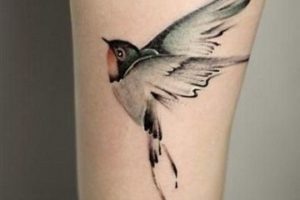 tatuajes de golondrinas volando en la pierna