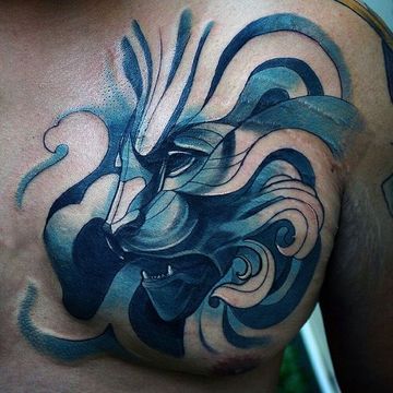 tatuajes de leon para hombres a color