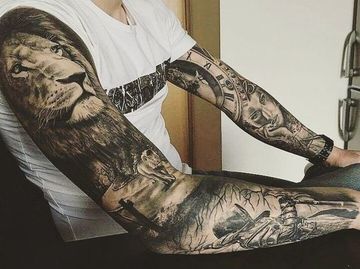 tatuajes de leon para hombres en el brazo