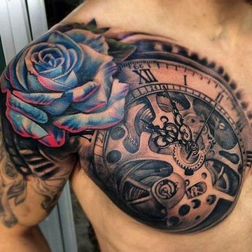 tatuajes de rosas para hombres en el hombro y el pecho