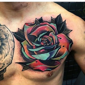 tatuajes de rosas para hombres en el pecho 1