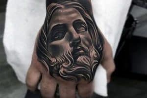 tatuajes en 3d de jesus en la mano