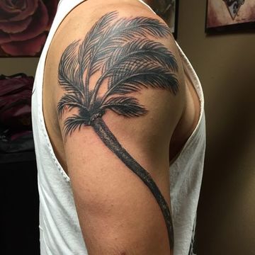 significado de tatuaje de palmera en el hombro