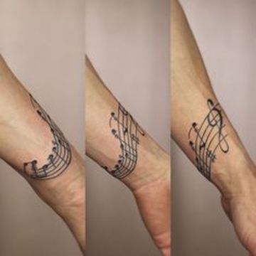 tatuajes de pentagramas musicales de hombres