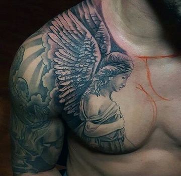 tatuajes en el pectoral para hombres religiosos
