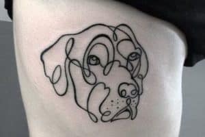 imagenes de tatuajes de perros dibujados en el costado