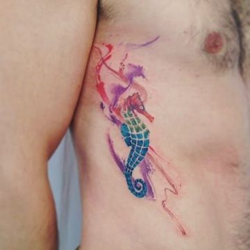 tatuajes de acuarela para hombres en el costado