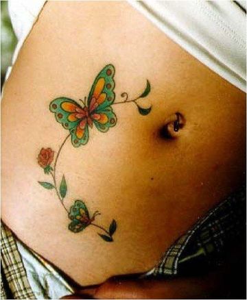 tatuajes de mujer en la panza de mariposas
