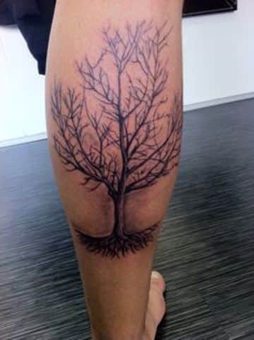 tatuajes de arboles para hombres en la pierna