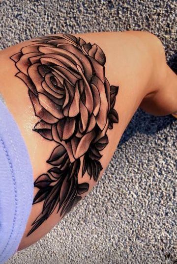 tatuajes de flores en la pierna hermoso