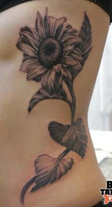 tatuajes en los costados para mujeres de girasol
