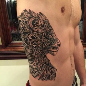 tatuajes en el costado para hombres animales
