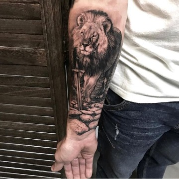 siginificado de tatuajes de leones en el antebrazo