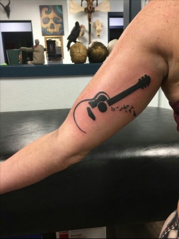 fotos de tatuajes de musica para hombre
