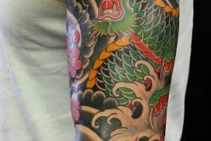 tatuajes de dragones chinos en el brazo para hombres