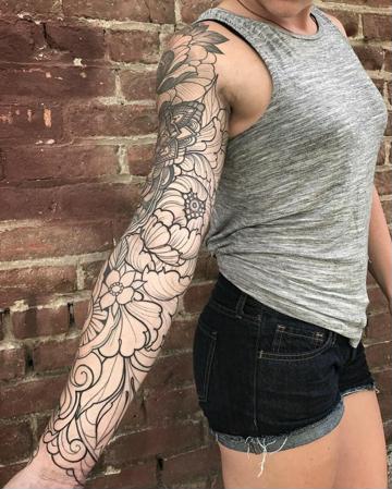 diseño de tattoo brazo completo de flores