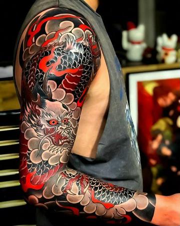 diseño de tattoo brazo completo japones
