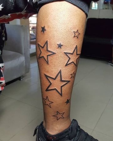 tatuajes de estrellas en la pierna silueta