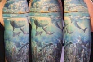 tatuajes de delfines en 3d brazo